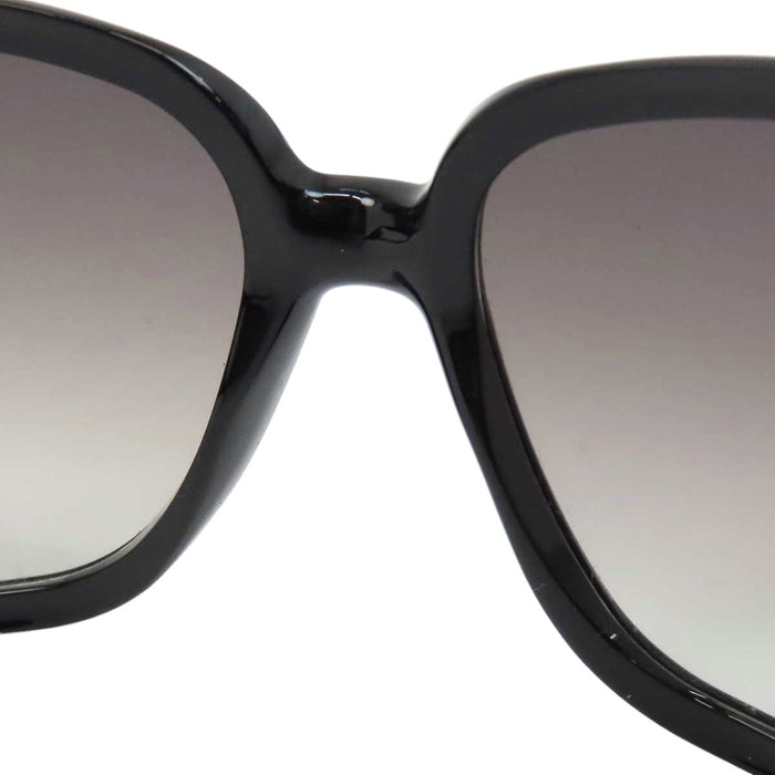 GUCCI 
Logo, métal doré, lentilles dégradées 
Lunettes avec mors de cheval