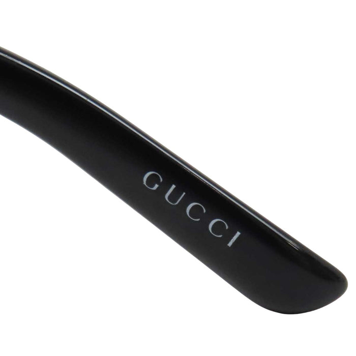 GUCCI 
Logo, métal doré, lentilles dégradées 
Lunettes avec mors de cheval
