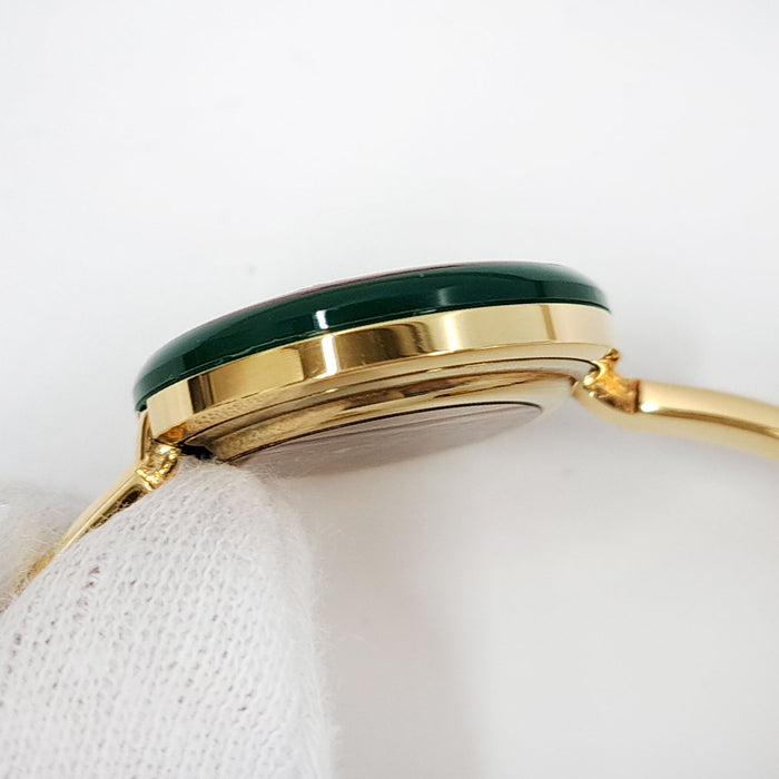 GUCCI 
Change Bezel 
With box and papers