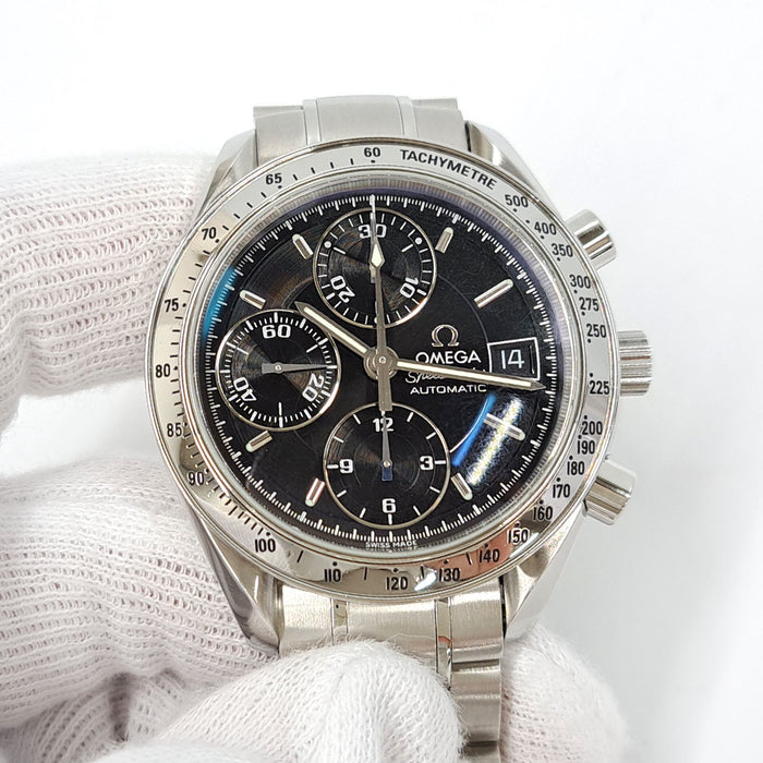 OMEGA 
Speedmaster Date 
With box and papers