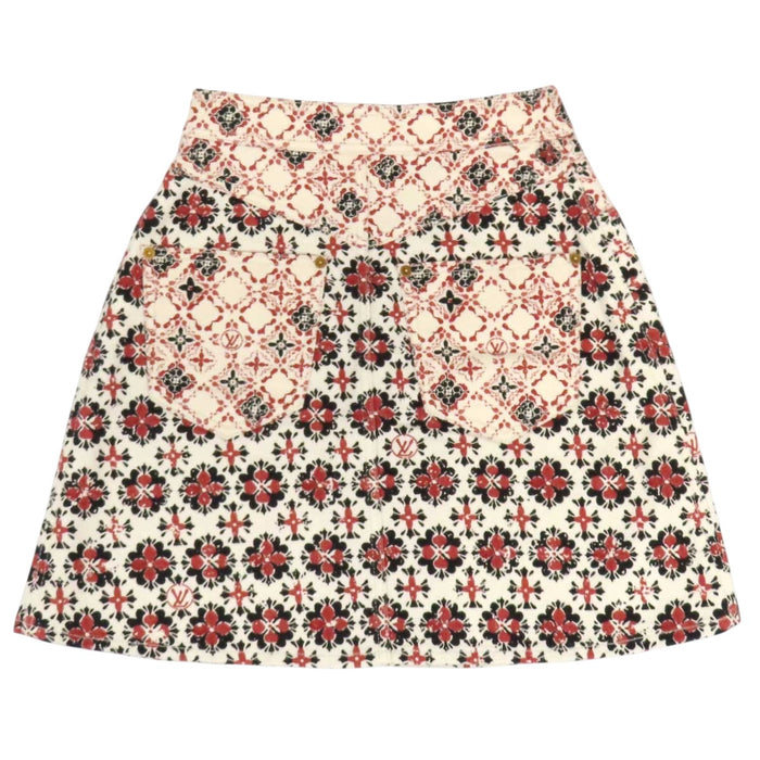LOUIS VUITTON 
Étiquette de bagage en coton à motif LV intégral 
Minijupe Monogram Flower