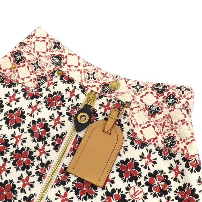 LOUIS VUITTON 
Étiquette de bagage en coton à motif LV intégral 
Minijupe Monogram Flower