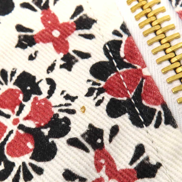 LOUIS VUITTON 
Étiquette de bagage en coton à motif LV intégral 
Minijupe Monogram Flower