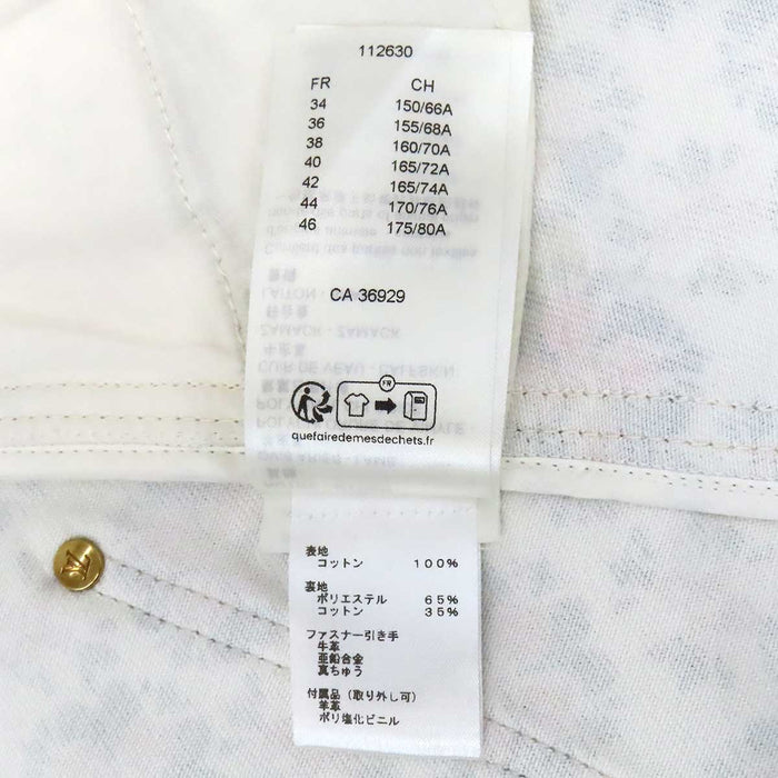 LOUIS VUITTON 
Étiquette de bagage en coton à motif LV intégral 
Minijupe Monogram Flower