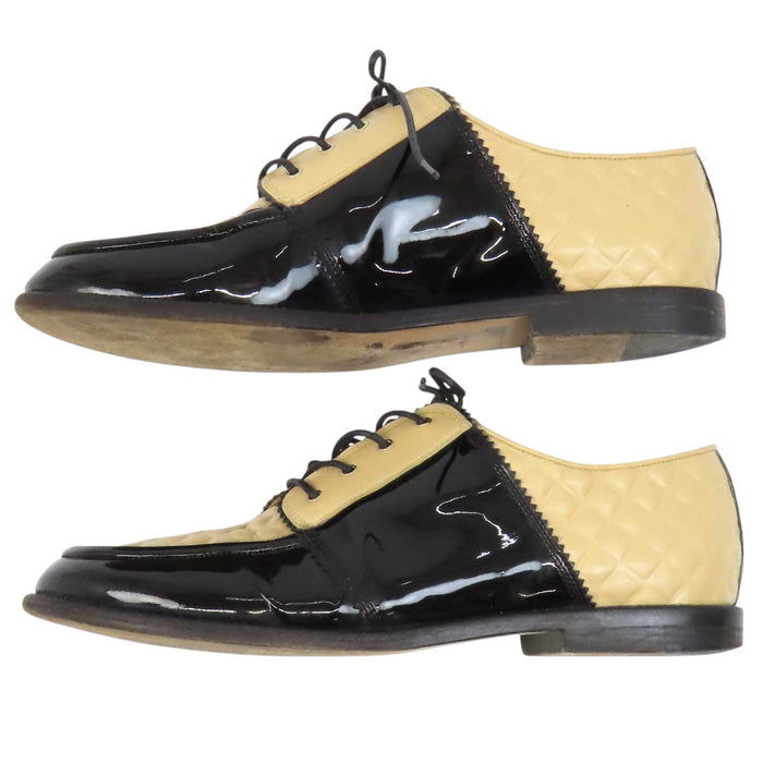 CHANEL 
COCO CC logo leather lace-up 
Coco logo two-tone loafers 
Matelassé