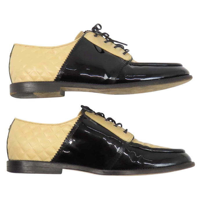 CHANEL 
COCO CC logo leather lace-up 
Coco logo two-tone loafers 
Matelassé