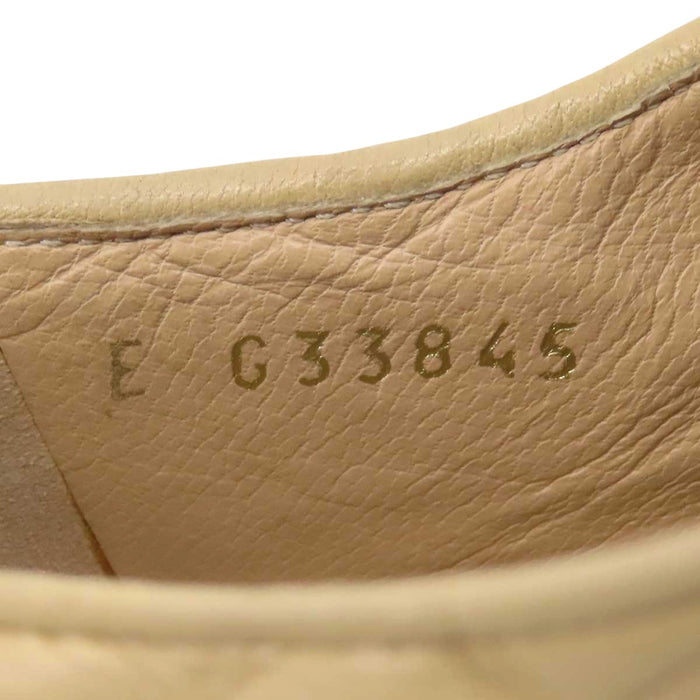 CHANEL 
COCO CC logo leather lace-up 
Coco logo two-tone loafers 
Matelassé