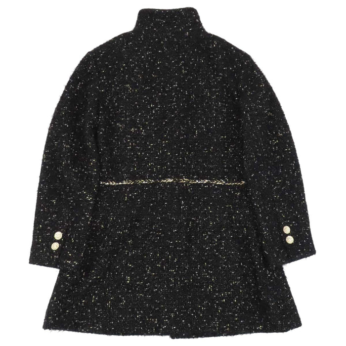 CHANEL 
COCO CC bouton Coco en laine pailletée 
manteau en tweed à motif Coco