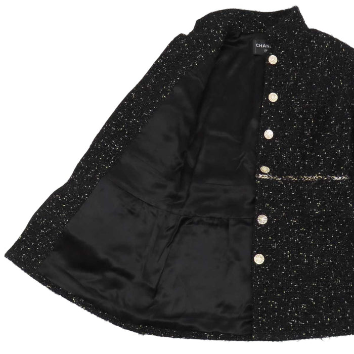 CHANEL 
COCO CC bouton Coco en laine pailletée 
manteau en tweed à motif Coco