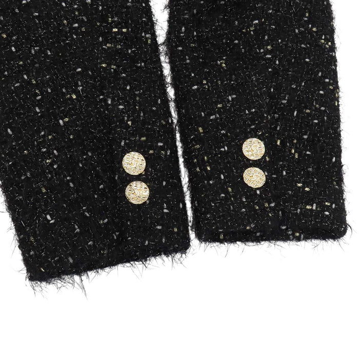 CHANEL 
COCO CC bouton Coco en laine pailletée 
manteau en tweed à motif Coco