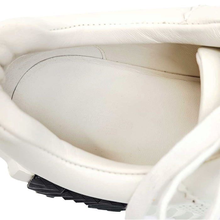 HERMES 
Ash H motif leather lace-up 
Bouncing sneakers
