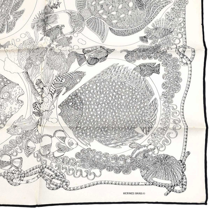 HERMES 
Petit Carré silk fish 
Carré 45 Grands Fonds Deep Sea