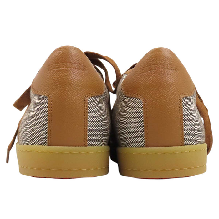 HERMES 
H logo low-top canvas leather lace-up 
Boomerang sneakers