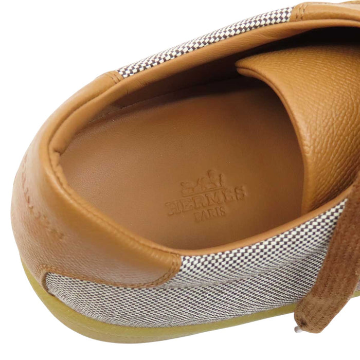 HERMES 
H logo low-top canvas leather lace-up 
Boomerang sneakers